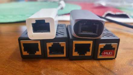 A bunch of Ethernet adapters huddled together