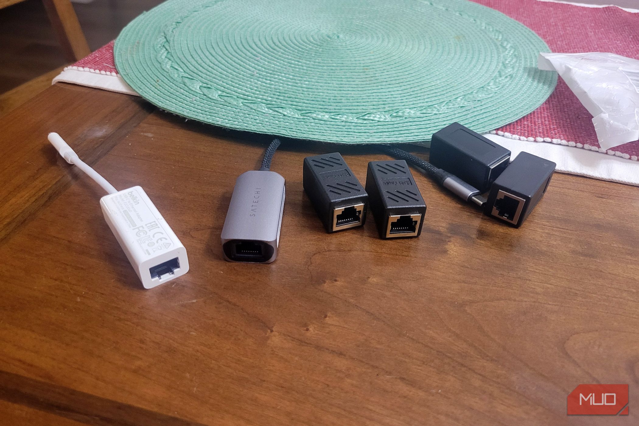 A bunch of ethernet adapters lying around