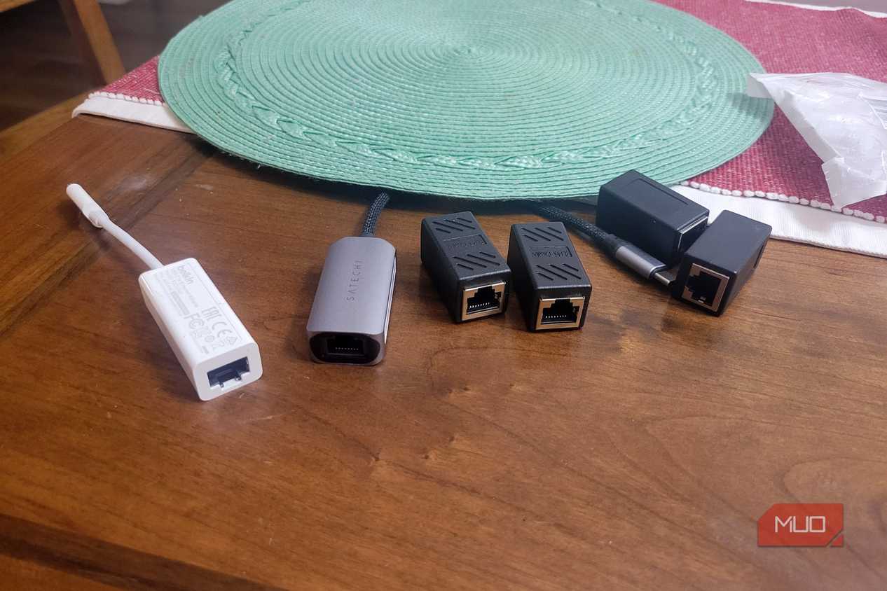 A bunch of ethernet adapters lying around