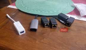 A bunch of ethernet adapters lying around