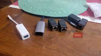 A bunch of ethernet adapters lying around