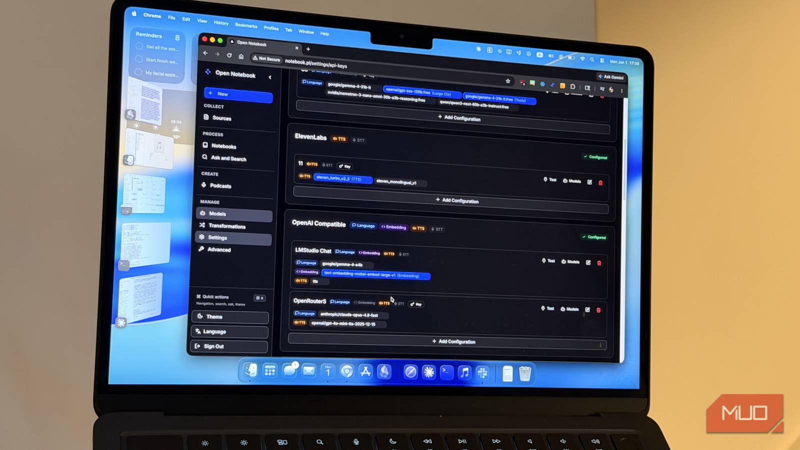 A laptop with the screen showing an open source self hosted NotebookLM alternative