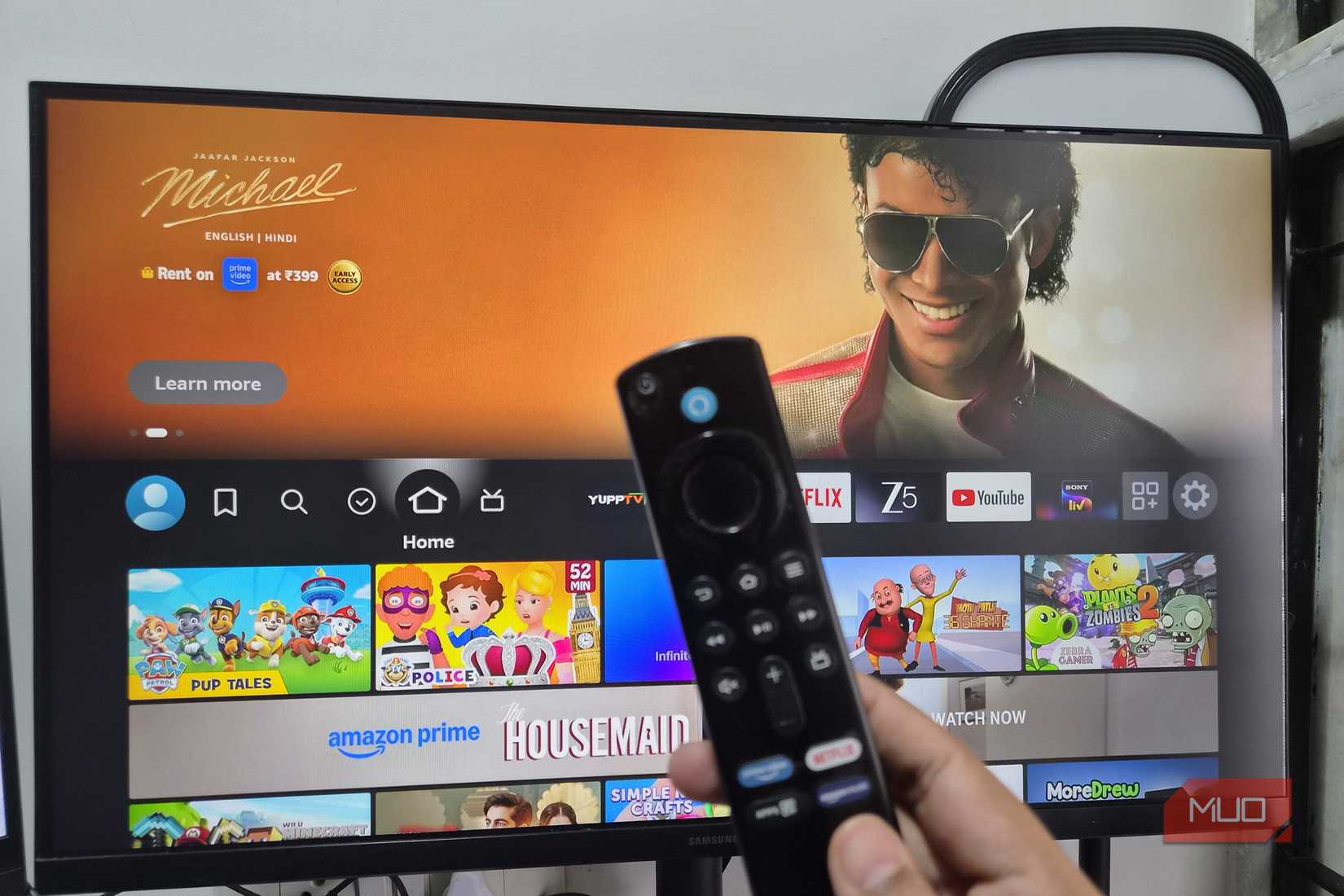 Amazon Fire TV stick remote and a monitor