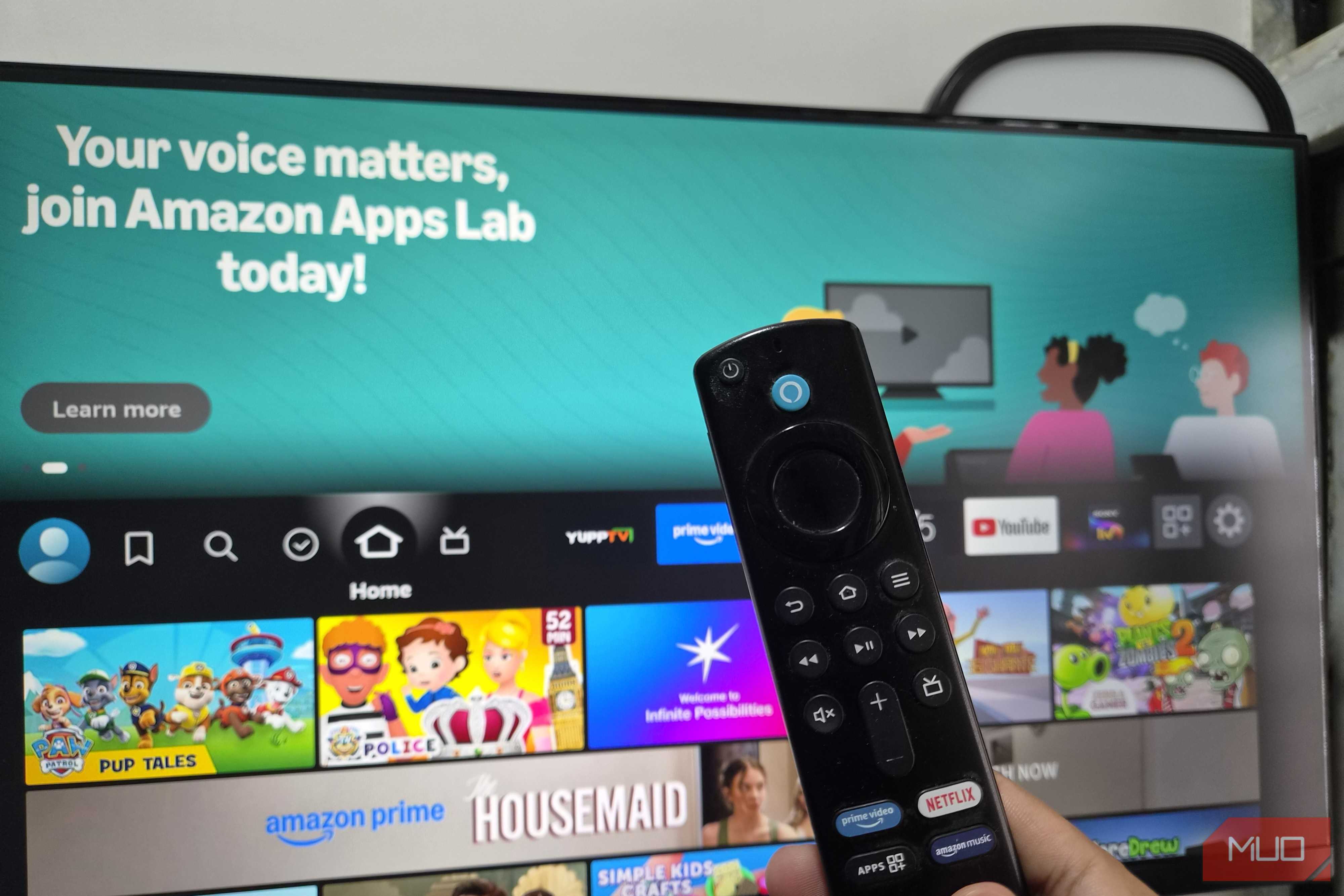Amazon Fire TV stick remote in front of a monitor