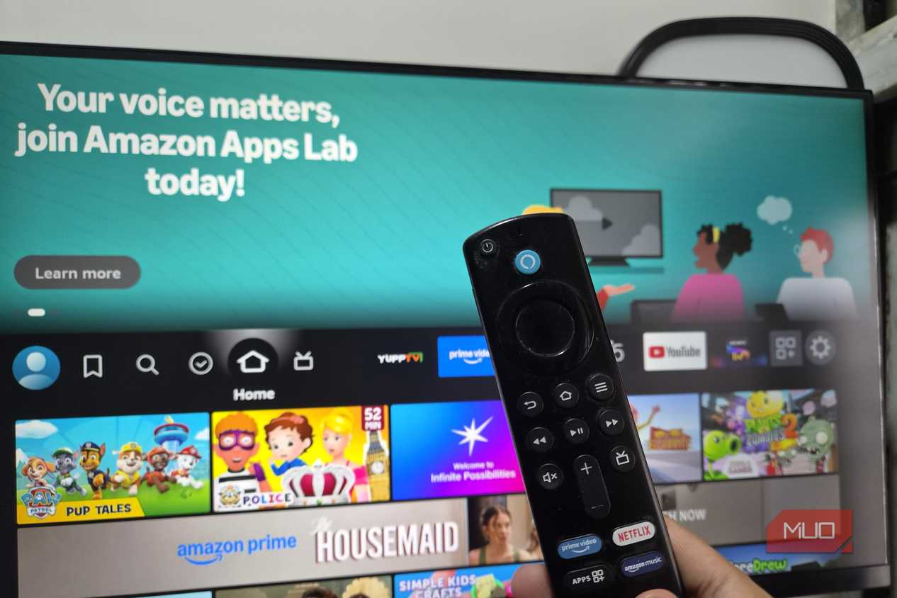 Amazon Fire TV stick remote in front of a monitor