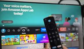 Amazon Fire TV stick remote in front of a monitor