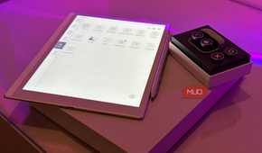 boox tappy case and buttons on box beside boox e-reader app drawer and stylus with purple lighting