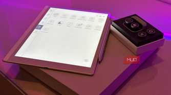 boox tappy case and buttons on box beside boox e-reader app drawer and stylus with purple lighting