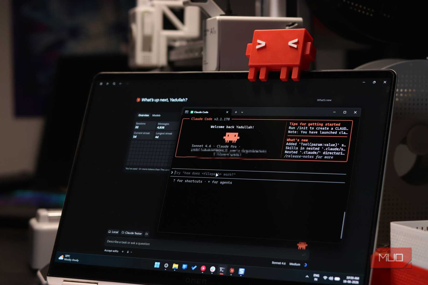 Claude Code terminal and desktop running on Windows 11 laptop.