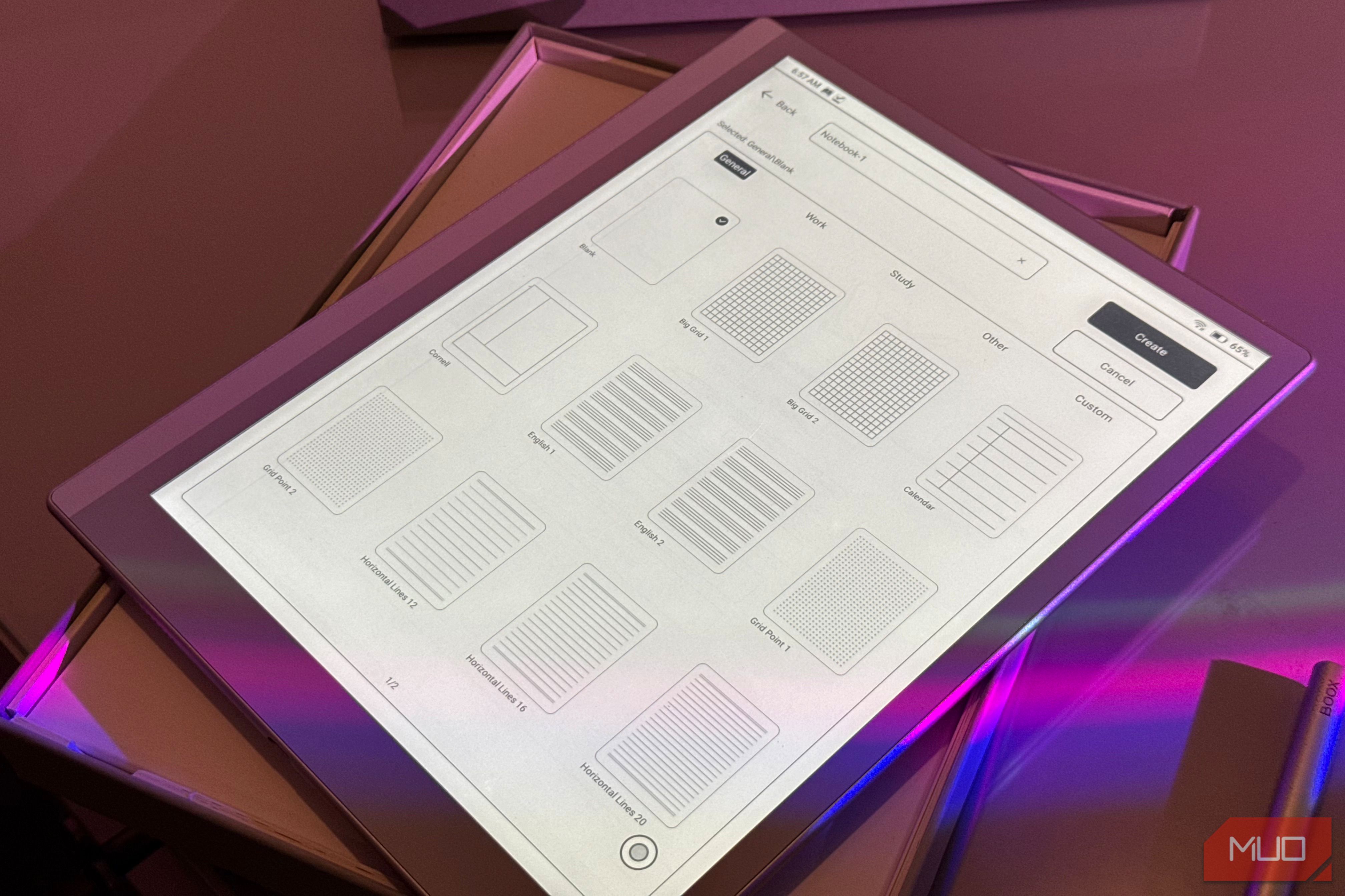 digital tablet displaying user interface wireframe mockups with purple ambient lighting