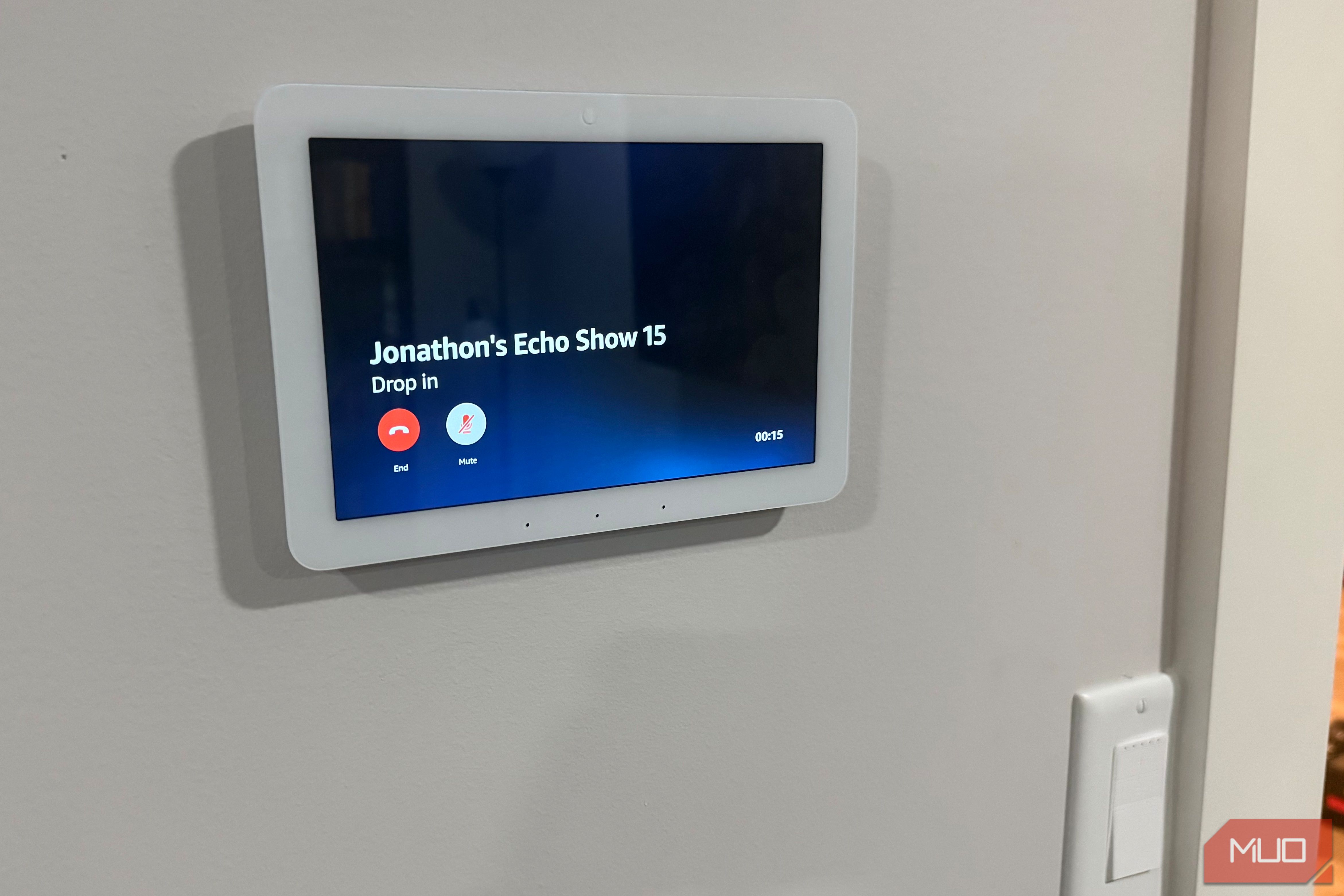 Echo Hub drop in call to Echo Show 15 beside light switch