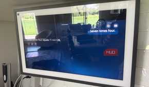 Echo Show 15 answering seven times four math question