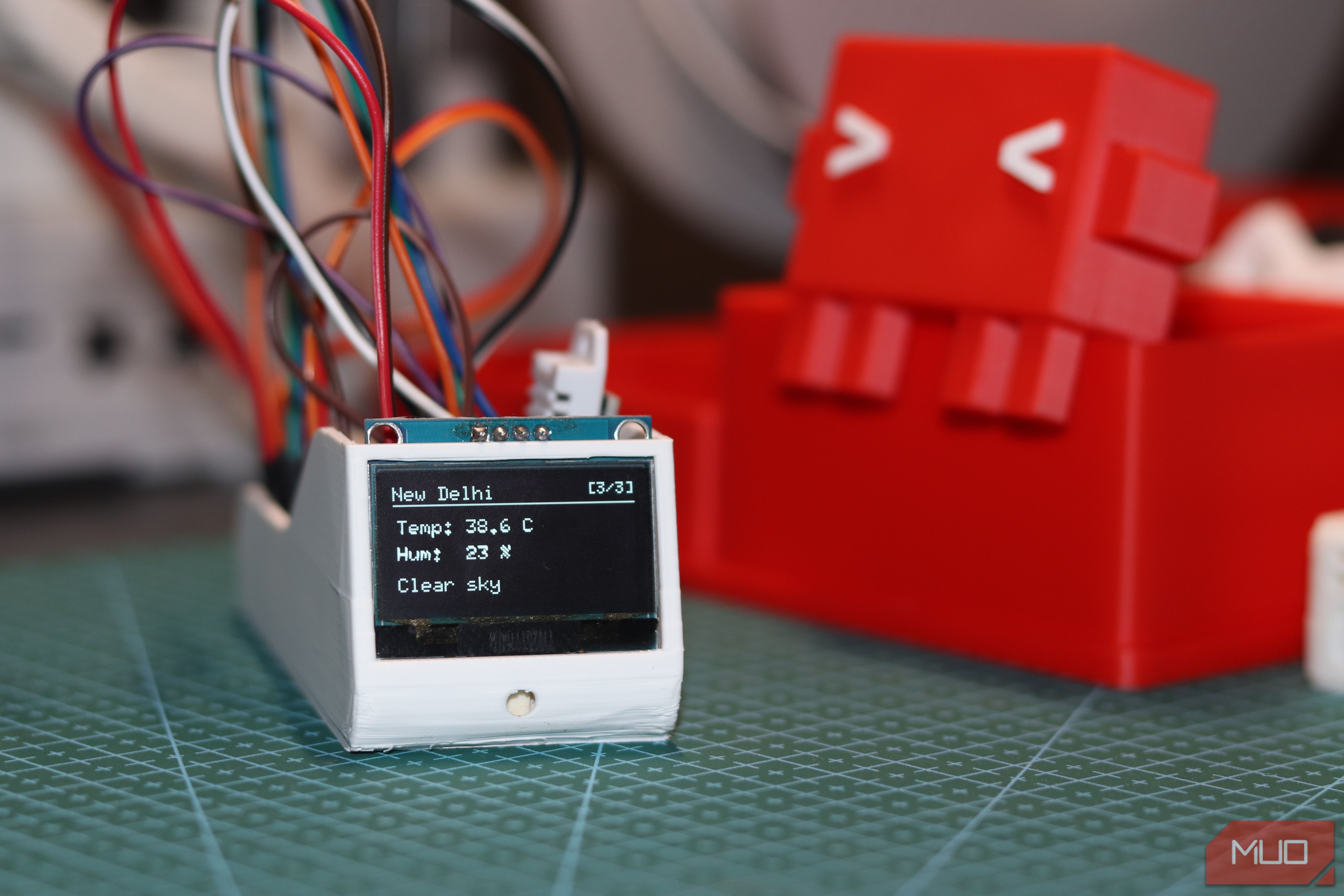ESP32 dashboard showing city weather.