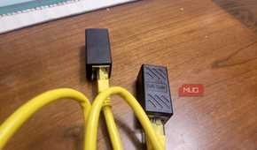 Ethernet cable plugged into an ethernet adapter