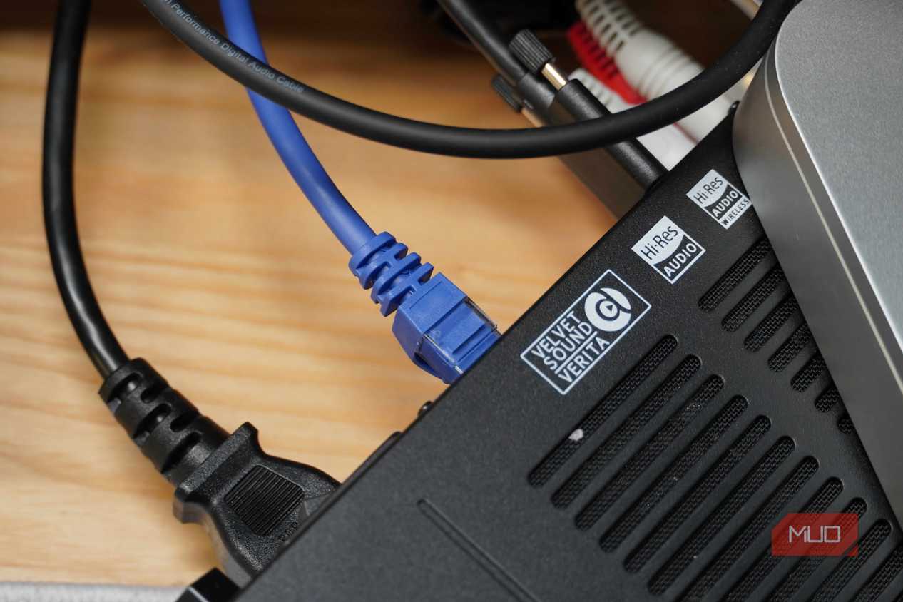 The Ethernet cable running into the back of the Fiio K15.