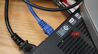 The Ethernet cable running into the back of the Fiio K15.