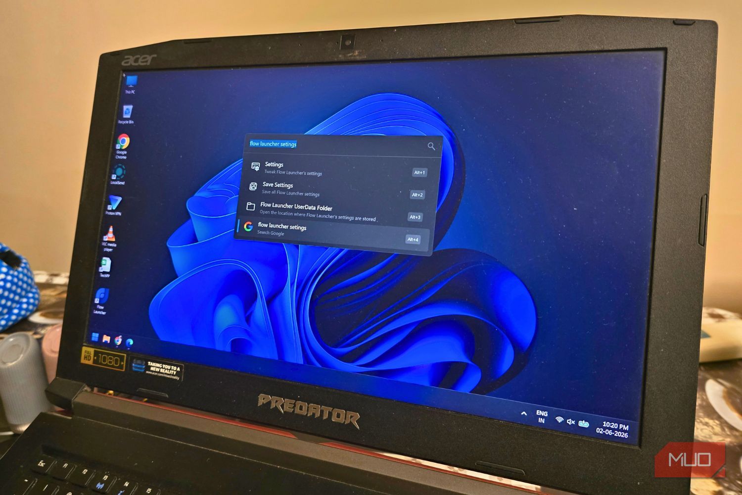 Flow Launcher open on a Windows laptop