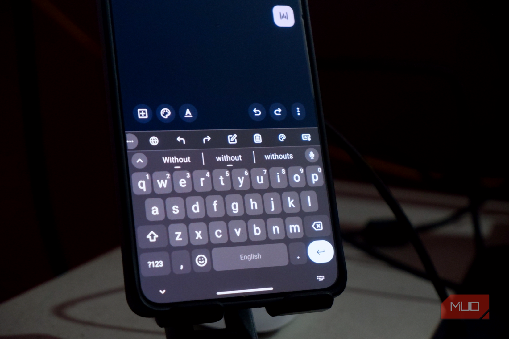 an Android smartphone showing the FUTO keyboard interface
