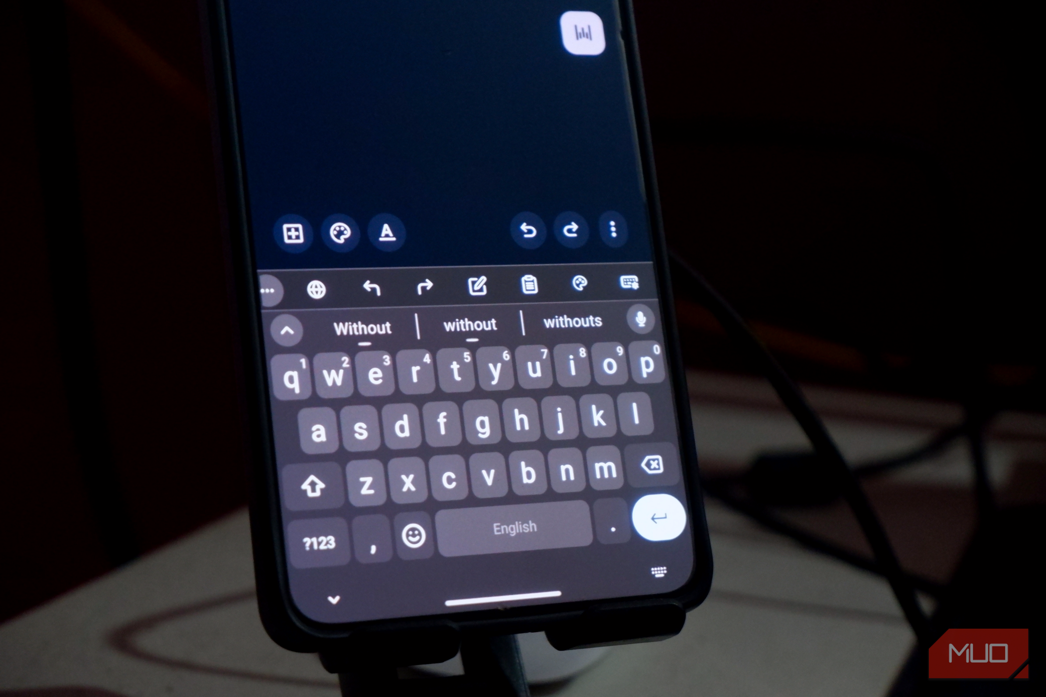 an Android smartphone showing the FUTO keyboard interface