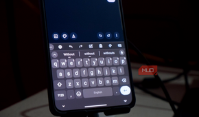 an Android smartphone showing the FUTO keyboard interface