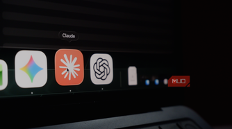 a MacBook Air dock displaying icons of Google Gemini, Claude, and ChatGPT