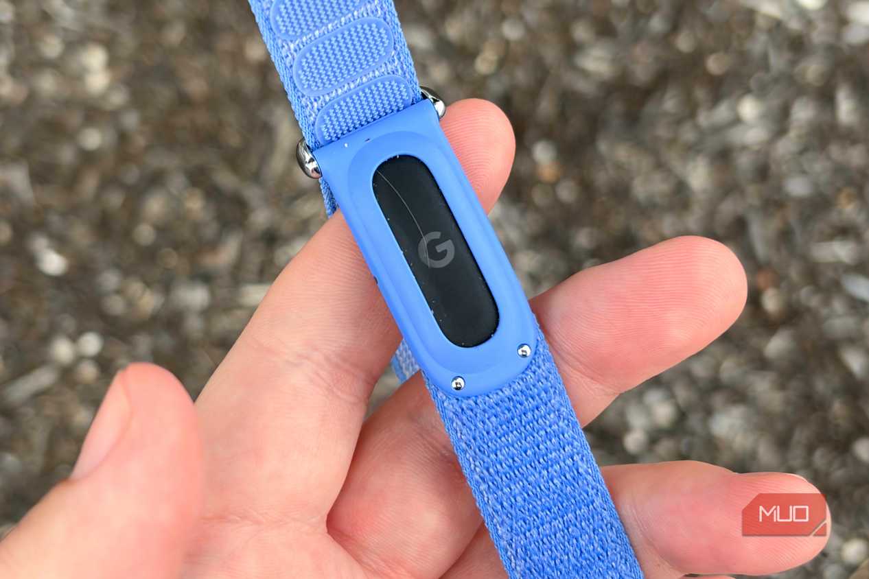 Fitbit Air in the hand.