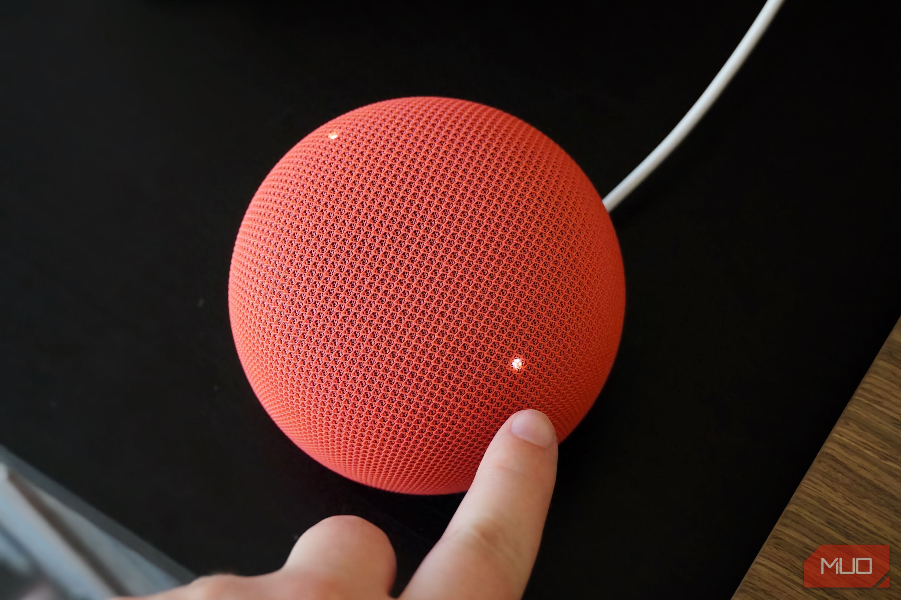 The buttons on the Google Home Speaker.