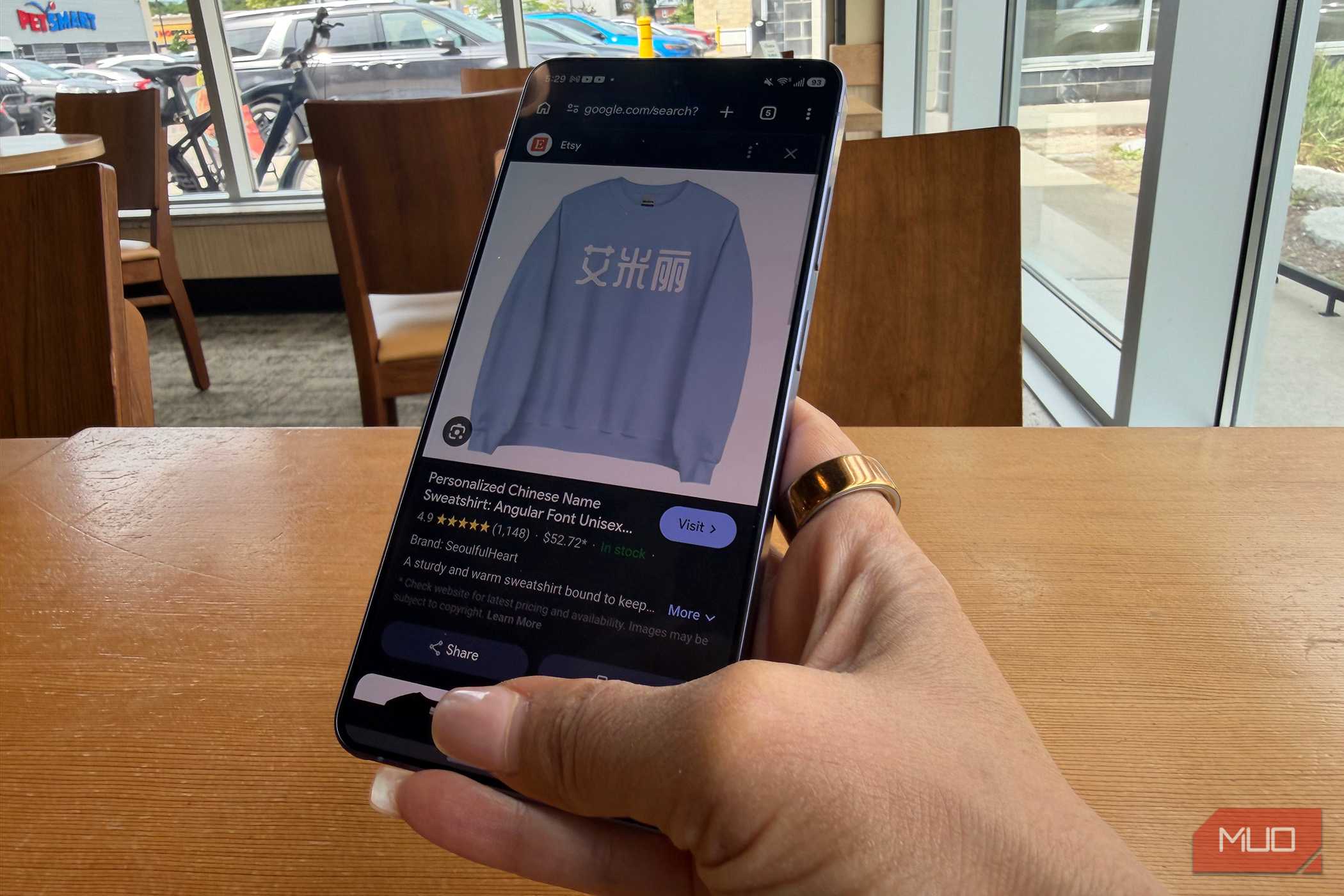 Google Circle to Search showing translation on an image on a phone.