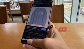 Google Circle to Search showing translation on an image on a phone.