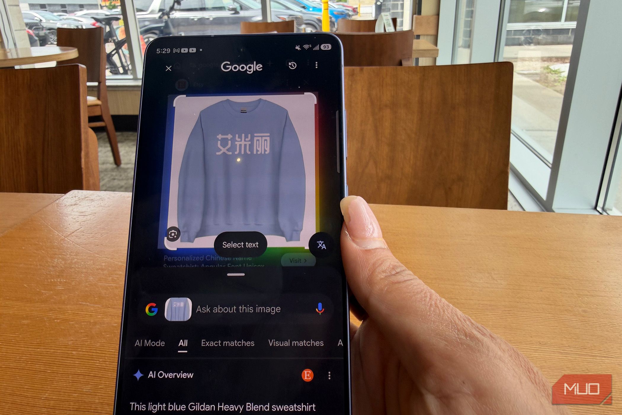 Google Circle to Search showing translation on an image on a phone.