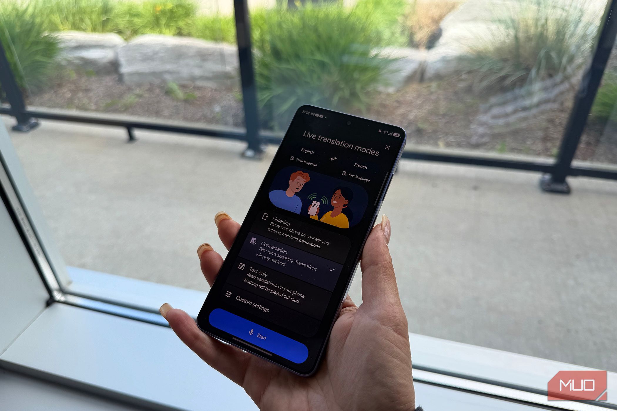 Conversation Mode open in the Google Translate app on a phone.