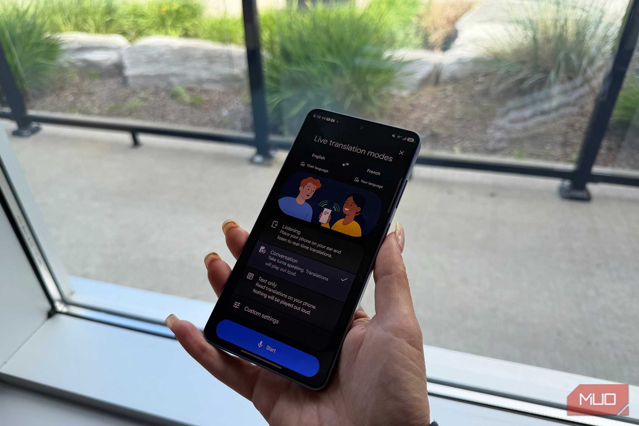 Conversation Mode open in the Google Translate app on a phone.