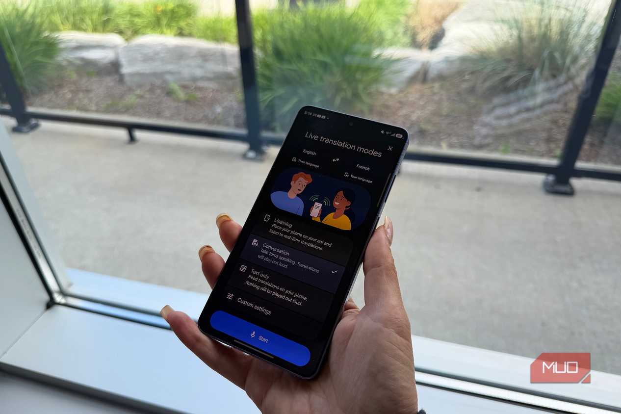 Conversation Mode open in the Google Translate app on a phone.