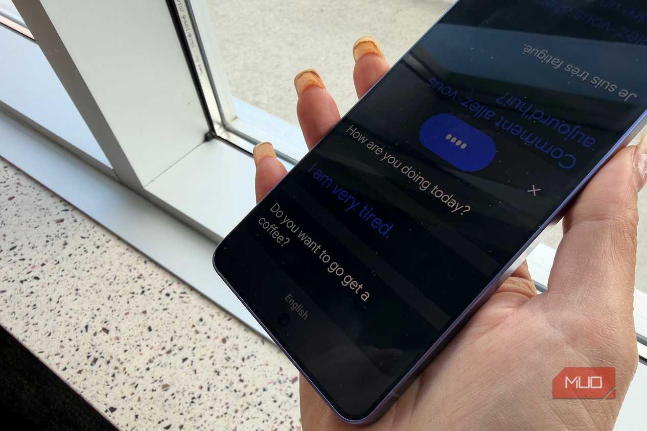 Conversation Mode open in the Google Translate app on a phone.