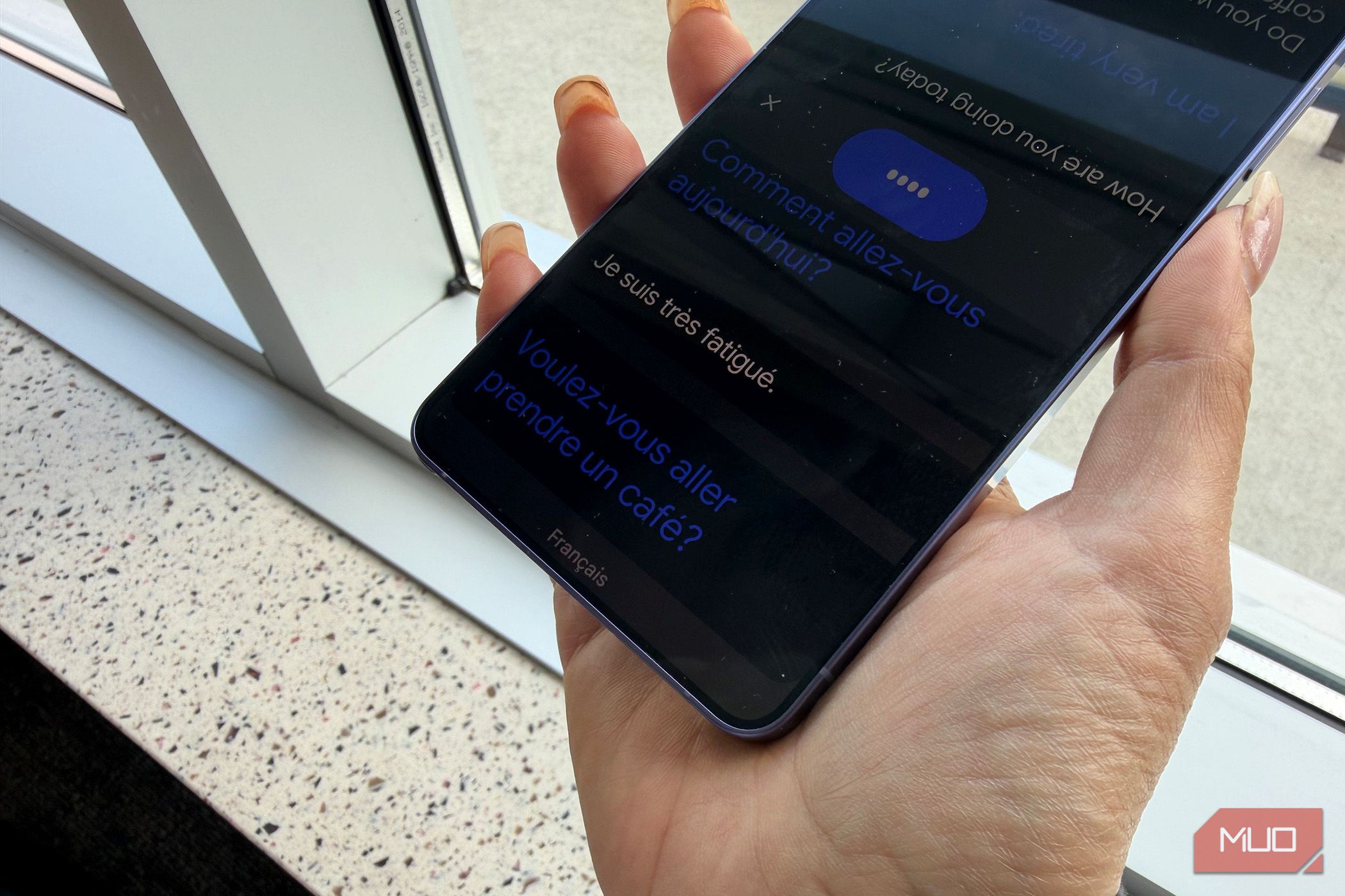 Conversation Mode open in the Google Translate app on a phone.