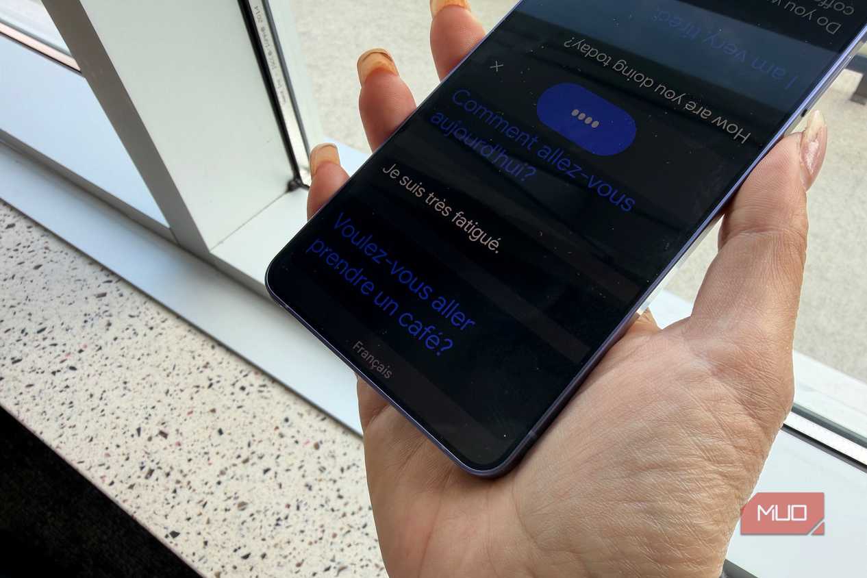 Conversation Mode open in the Google Translate app on a phone.