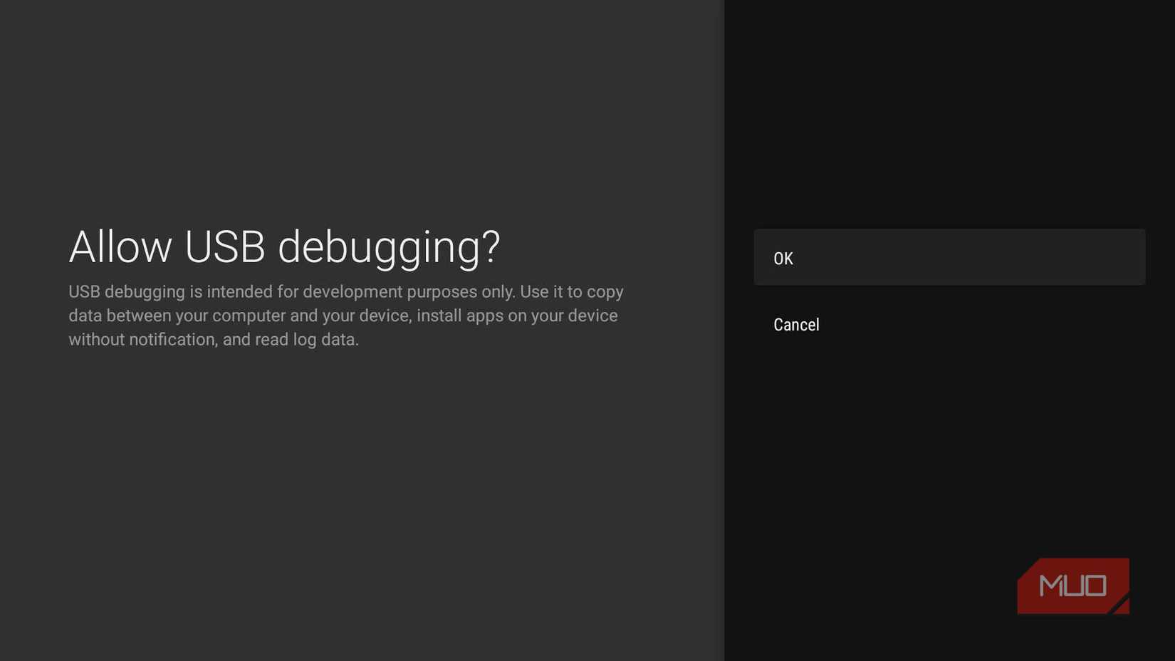 Google TV USB debugging confirmation dialog with OK and Cancel options