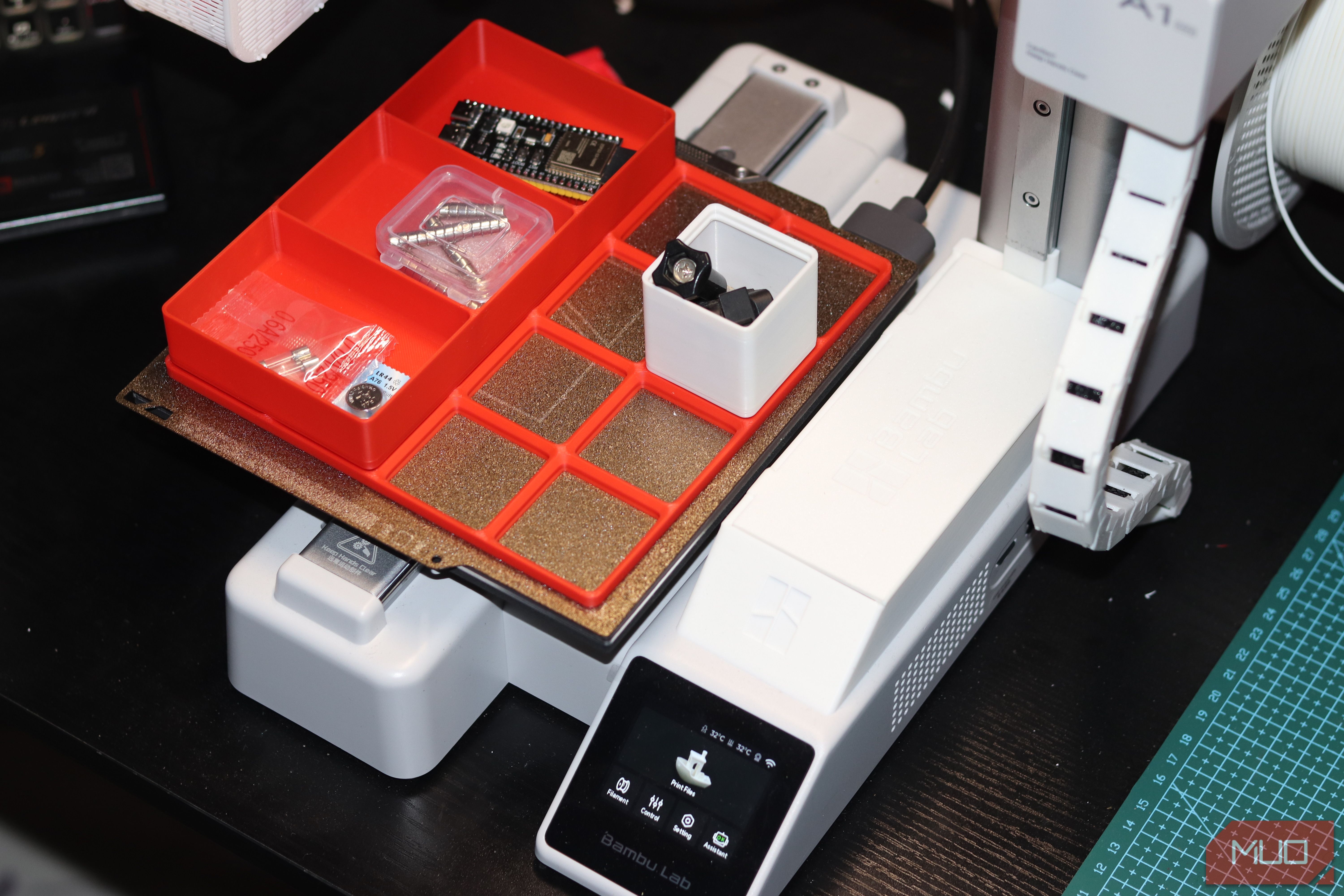 Gridfinity baseplate and bins on 3D printer.