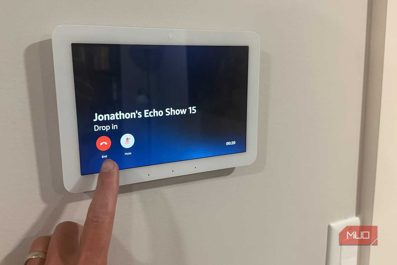 Hand pressing end on Echo Hub drop in call to Echo Show 15