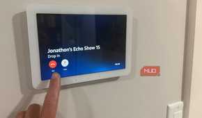 Hand pressing end on Echo Hub drop in call to Echo Show 15
