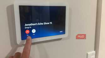Hand pressing end on Echo Hub drop in call to Echo Show 15