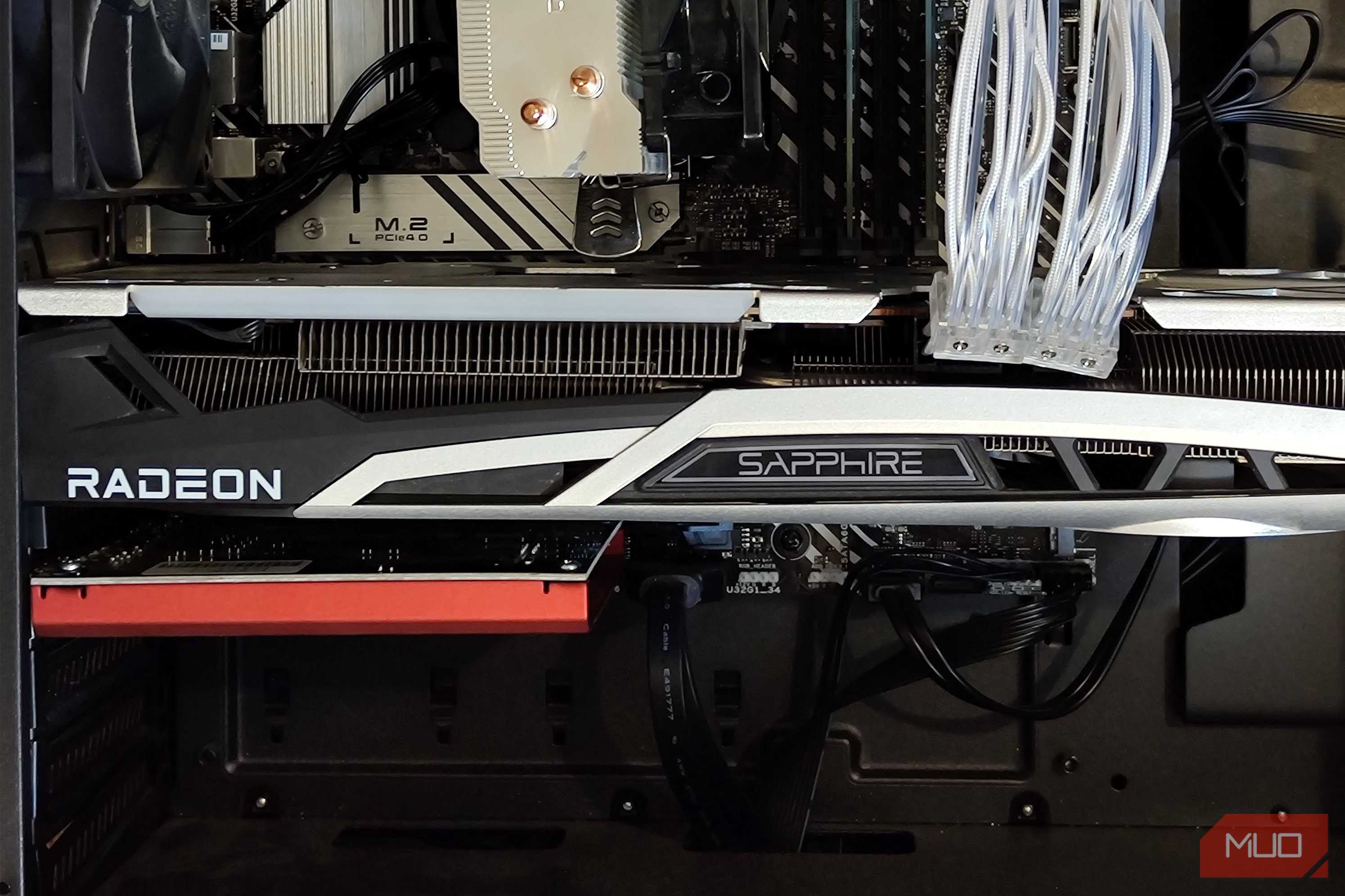 Inside of a PC case showing a graphics card and an audio card