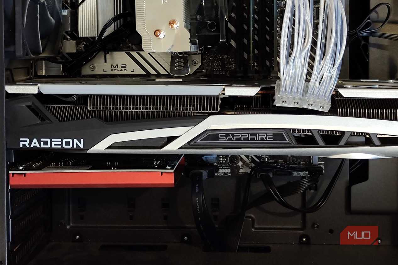 Inside of a PC case showing a graphics card and an audio card
