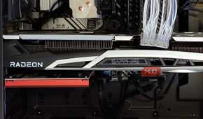 Inside of a PC case showing a graphics card and an audio card