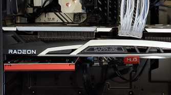 Inside of a PC case showing a graphics card and an audio card