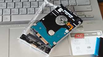 internal hard drive dismantled and kept on a laptop