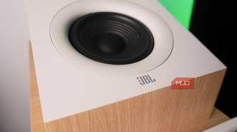 The woofer on a Dolby Atmos speaker.