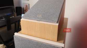 Dolby Atmos speakers positioned atop floor units.