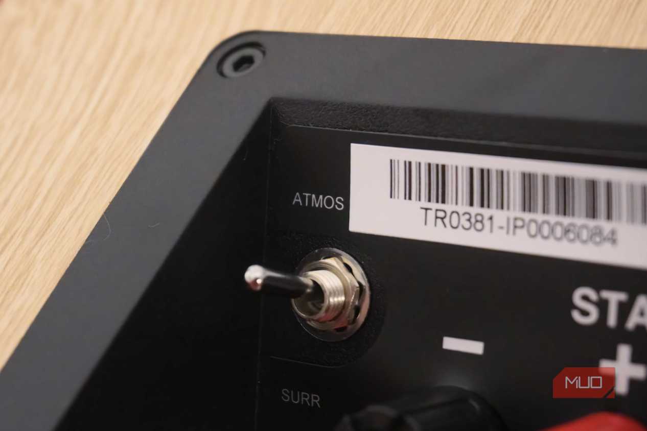 The Atmos switch on a pair of JBL Stage2 height speakers.