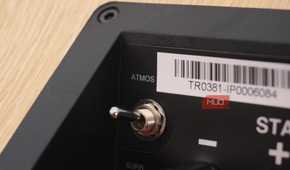 The Atmos switch on a pair of JBL Stage2 height speakers.